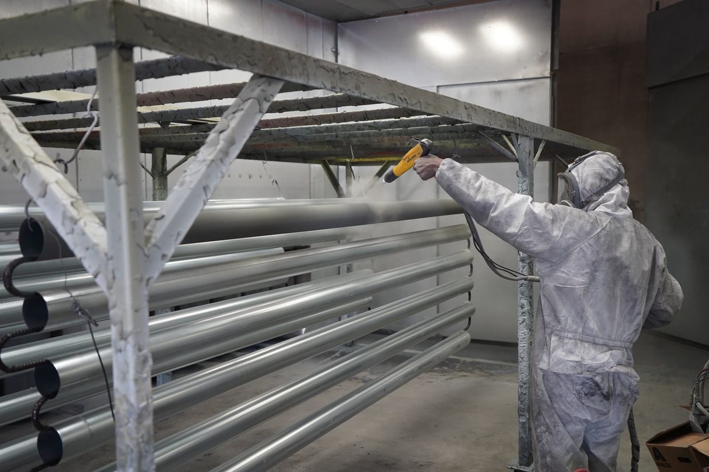 Epoxy powder coating applied to steel pipes and valves for corrosion protection